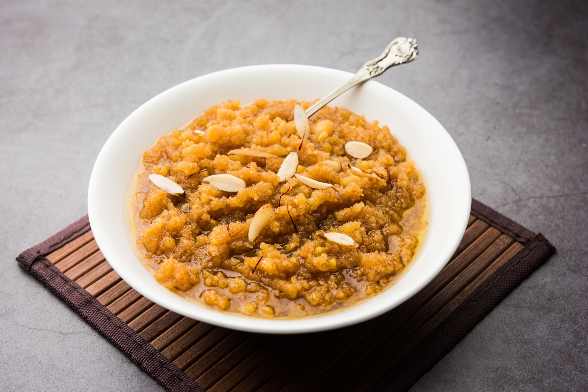 Moong Dal Halwa or Mung Daal Halva is an Indian sweet / dessert recipe, garnished with dry fruits